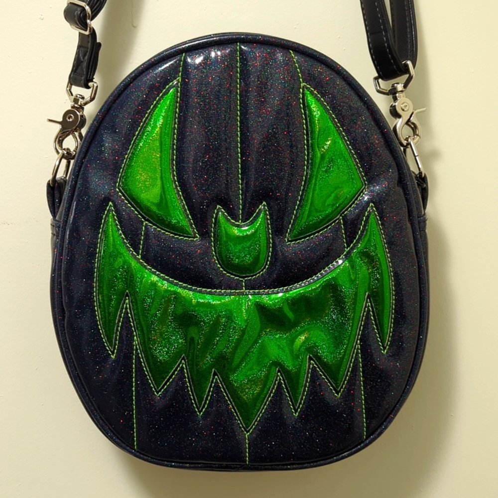 Love Pain & Stitches Oval Pumpkin bag, Navy/Green glitter